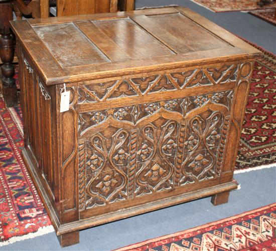 A small 17th century style carved oak coffer W.84cm